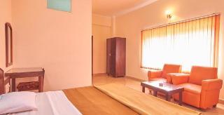 Woodside Hotel Мангалор Екстериор снимка