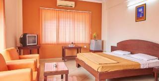 Woodside Hotel Мангалор Екстериор снимка