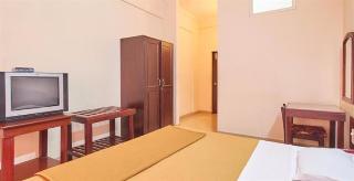 Woodside Hotel Мангалор Екстериор снимка
