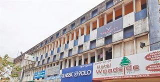 Woodside Hotel Мангалор Екстериор снимка